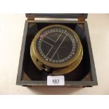 A ships compass in wooden case