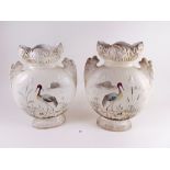 A pair of Victorian vases painted storks - 25cm - one with hairline crack