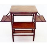 An Edwardian occasional table with folding flaps