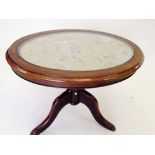 A Victorian oval topped coffee table (alterations)