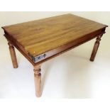 A mahogany iron bound dining table