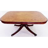 An early 19th century mahogany breakfast table with wide crosssbanded border, all on turned column