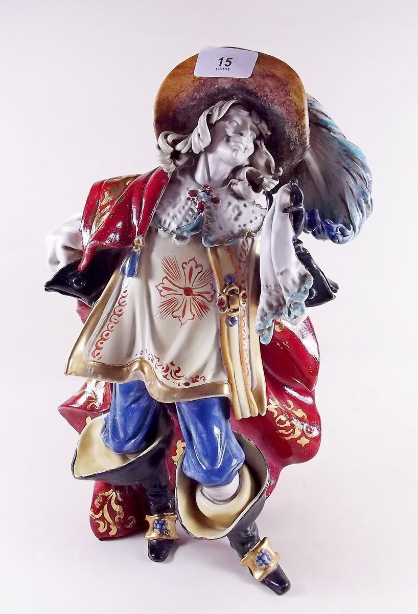 A large Capodimonte figure of a musketeer 35cm