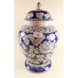 A large blue and white Chinese reproduction vase and cover - 37cm