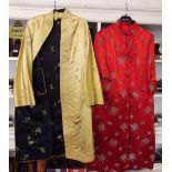 Two Chinese silk embroidered robes in red and reversible black and cream