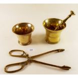 Two brass mortars, one pestle and a pair of fire tongs