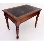 A Victorian mahogany side table on turned supports