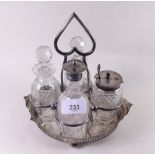 A silver plated and cut glass cruet stand and four bottles