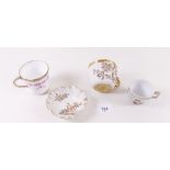 A Worcester coffee cup and teacup (no saucer) a Worcester pin dish No 1343 and a Meissen style