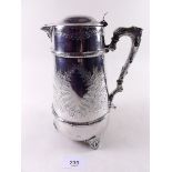 A Victorian silver plated lidded jug with engraved ferns and naturalistic branch handle