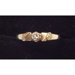 A 9 carat gold diamond solitaire ring