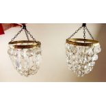 A pair of cut glass basket form light fittings