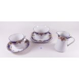 A 1930's tea service with printed borders 'Forestic' comprising:- six cups and saucers, jug,