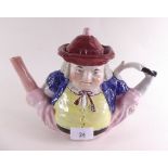 A Victorian Staffordshire novelty teapot in the form of a man with splayed legs, lid restored