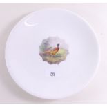 A porcelain plate painted pheasant by ex Worcester artist