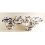 A Booths group of fruit printed teaware comprising: jug, three breakfast cups, one tea cup and