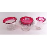 Two cranberry glass bowls and a frilled top jug