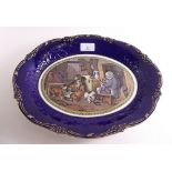 A Royal Cauldon oval dish printed 'Highland Music' by Landseer, printed from a Prattware pot lid