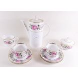 A Royal Worcester 'Royal Garden' coffee service comprising: comprising coffee pot, nine cups and