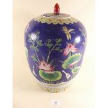 A Chinese style jar and cover painted birds and lotus - 30cm