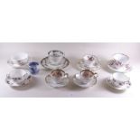 A collection of Victorian floral teacups and saucers including: George Jones Crescent, Coalport,