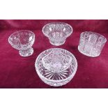 Two cut glass fruit bowls, a cut glass basket and an oval vase