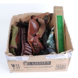 Box containing two cartridge bags, cartridge belts, leather shooting gloves, Co2 bottles and 12 bore