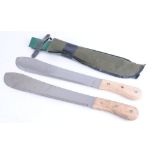 Two modern machetes, each with 14, 1/2 ins bolo blades, wood grips, in canvas sheathes