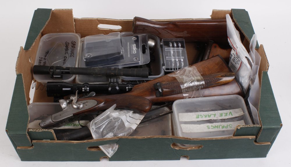 Box containing quantity of miscellaneous gun parts, stock, action and forend (no. 132351) and