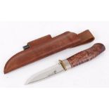 Swedish hunting knife by Karesuando, 4 ins single edged polished blade, wood grip, in leather sheath