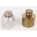 Brass circular oil bottle by J. Woodward & Son, together with a glass circular oil bottle, the white