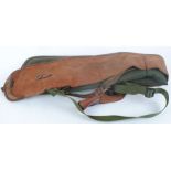 Brady canvas and leather gun slip and a fleece lined gun slip