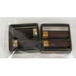 Pair of 12 bore ebony and brass snap caps stamped Wm. Powell & Son, together with another pair of 20