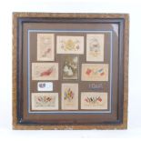 Framed and glazed display of WW I, embroidered silk greetings cards