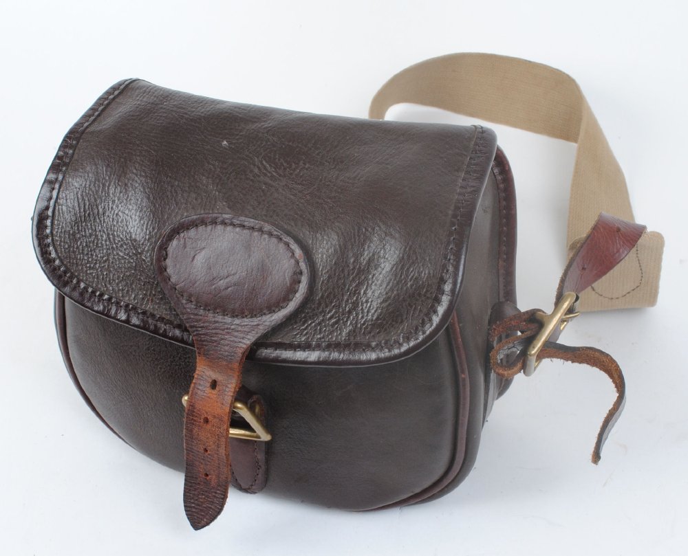 Leather cartridge bag with webbing strap
