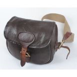 Leather cartridge bag with webbing strap