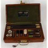 12 bore cleaning kit in William Powell & Son fitted wooden presentation box, comprising cleaning