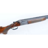 12 bore Italian, over and under, ejector, 27,1/2 ins barrels, 70mm chambers, scroll engraved action,