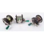 Two Penn 85 sea fishing reels and Penn 78 sea fishing reel