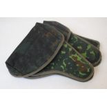 Three military style camo pistol holsters