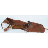 Brady canvas and leather gun slip with 12 bore leather cartridge belt