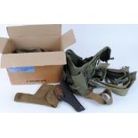 Box of assorted webbing belts, holsters, gaitors, etc.