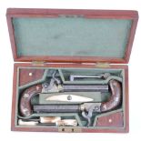 Cased pair percussion pocket pistols with octagonal turn off damascus barrels, engraved nickel
