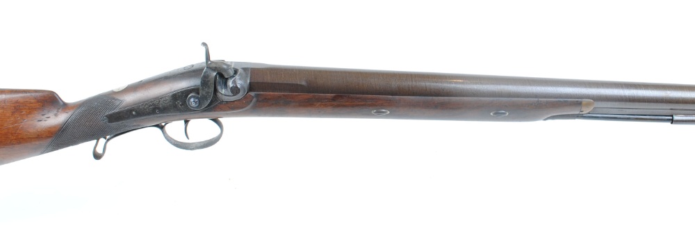 8 bore Percussion single bank gun, 33,1/2 ins half stocked brown damascus barrel, wood (replacement)