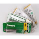 Four Remington chokes in blister packs, two skeet & two IC