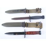 US M3 knife with rubber grips and sheath and M4 bayonet with wood grips and M8A1 scabbard both