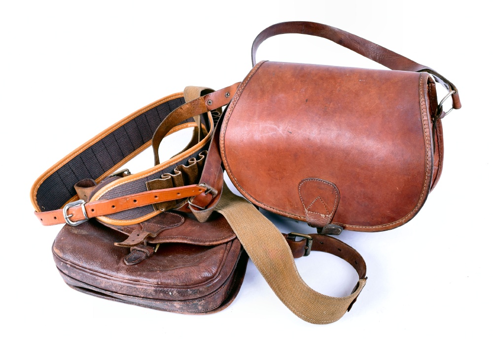 Two leather cartridge bags and 12 bore suede cartridge belt