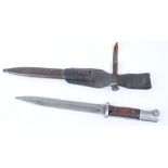 German S84/98 bayonet with 10 ins single edged blade, wood grips, metal scabbard and leather frog