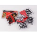 Three pairs of Warne scope rings; Millet scope rings and mount, all in blister packs