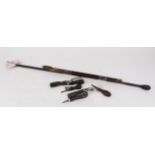 Ebony two piece cleaning rod and others, quantity of turnscrews, chamber brush, extractor, etc